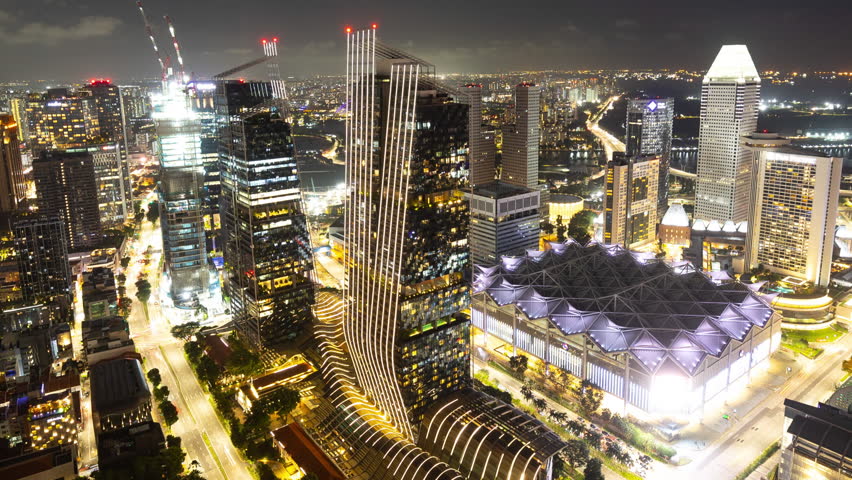 SINGAPORE - 3 MARCH 2025 : timelapse of the singapore city skyline from a high vantage point at night