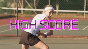 Preparing to serve, tennis player with animation of High Score text overlay. athlete, sports, competition, victory, scoring, animated text - Powered by Shutterstock - Get 15% off with code: PIKWIZARD15