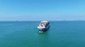 Aerial front view cargo ship carrying container and running for export goods from cargo yard port to custom ocean concept technology transportation. container ship  export import shipping service. - Powered by Shutterstock - Get 15% off with code: PIKWIZARD15