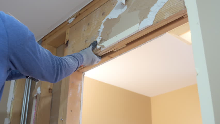 Construction process of Demolition of a wall in room. Dismantling and renovation of apartment in house. 