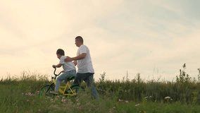 boy beloved father learning ride bike, family bike ride outdoors, man child kid boy outdoors learning ride bike park, cheerful people riding bike green grass, little son boy schoolboy dad park, family - Powered by Shutterstock - Get 15% off with code: PIKWIZARD15