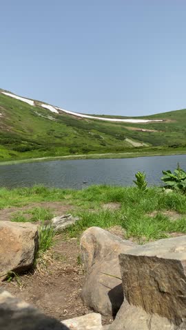Crystal Lake in Mountains, Remote Wilderness, Serene Landscape, Mountain Hiking, Clear Water, Green Valley, Rocky Terrain, Nature Beauty, Outdoor Exploration, Mountain Scenery