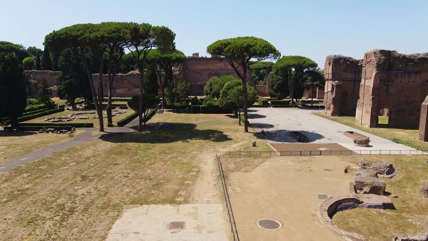 Remains of the Roman Baths of Caracalla surrounded by Mediterranean pine trees