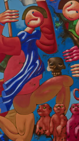 Vertical back view shot of young Black man following audio tour observing abstract paintings with smartphone wearing earphones in modern art gallery