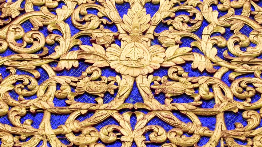 Details of colorful golden gold Wat Phra That Doi Suthep temple building wall texture in Chiang Mai Amphoe Mueang Chiang Mai Thailand in Southeastasia Asia.