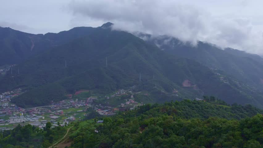 Chandragiri, Kathmandu, Nepal offers lush green hills, panoramic Himalayan views, dense forests, and fresh mountain air, making it a perfect nature retreat with scenic opposite to cable car peck.