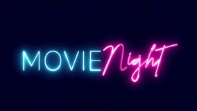 Movie night neon sign. Movie night text font with light. Luminous and shimmering haze inside the letters of the text Movie night.  - Powered by Shutterstock - Get 15% off with code: PIKWIZARD15