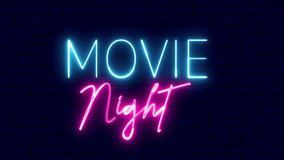 Movie night neon sign. Movie night text font with light. Luminous and shimmering haze inside the letters of the text Movie night.  - Powered by Shutterstock - Get 15% off with code: PIKWIZARD15