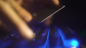 A backlit keyboard and a map in your hand symbolize payment for in-game goods and services. Background blur enhances the digital atmosphere. Gaming Industry: Paying for Online Video Game Purchases - Powered by Shutterstock - Get 15% off with code: PIKWIZARD15