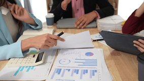 Financial Analysis in Corporate Office Business professionals work together to plan and analyze business in corporate offices. - Powered by Shutterstock - Get 15% off with code: PIKWIZARD15
