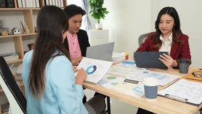 Financial Analysis in Corporate Office Business professionals work together to plan and analyze business in corporate offices. - Powered by Shutterstock - Get 15% off with code: PIKWIZARD15