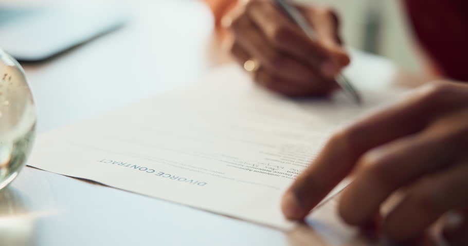 Sign, documents and hands of person for divorce paperwork, contract and legal agreement. Writing, separation and closeup of signature with pen for marriage fail, relationship settlement and breakup
