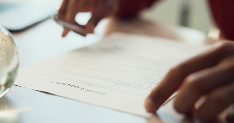 Sign, documents and hands of person for divorce paperwork, contract and legal agreement. Writing, separation and closeup of signature with pen for marriage fail, relationship settlement and breakup