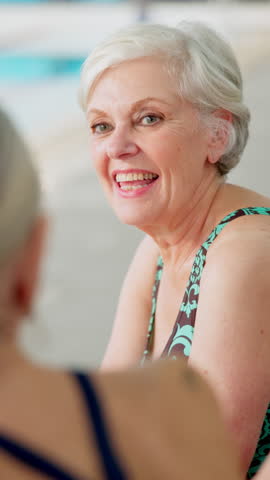 Conversation, swimming pool and senior women with smile, funny and happiness with discussion. Friends, pensioner and people with joy, water and humor in wellness facility, healthy and laugh with joke