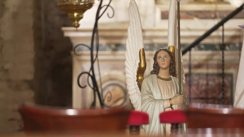 Angel statue in a Catholic church interior