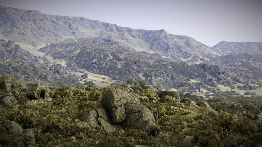 A tranquil landscape features large boulders scattered across a rugged terrain, surrounded by steep mountains under a misty sky, creating a serene and isolated atmosphere.