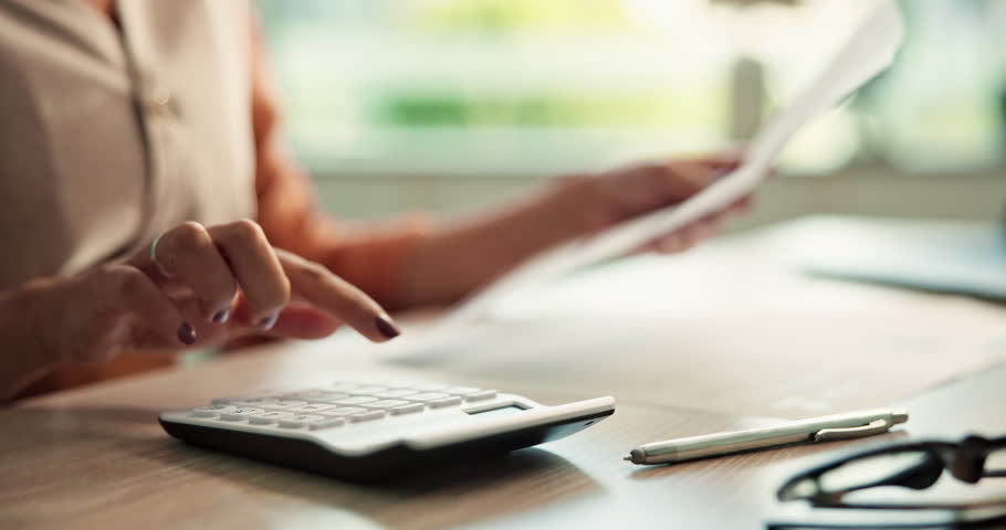 Hands, documents and calculator as accountant with payroll, investing and audit for finance agency. Person, bookkeeping and corporate taxes for loan, paperwork and review as asset management for bank