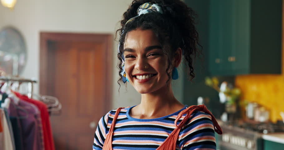 Woman, face and happy with fashion for small business, creative opportunity and about us in workshop. Entrepreneur, laugh and confident in startup for textile knowledge, clothes seller and designer