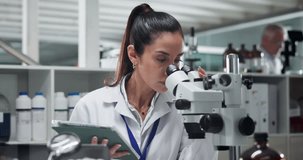Microscope, science and woman on tablet for experiment, chemistry research and drugs development. Medical, microbiology and scientist with biotechnology for pharma, exam or check test results in lab - Powered by Shutterstock - Get 15% off with code: PIKWIZARD15
