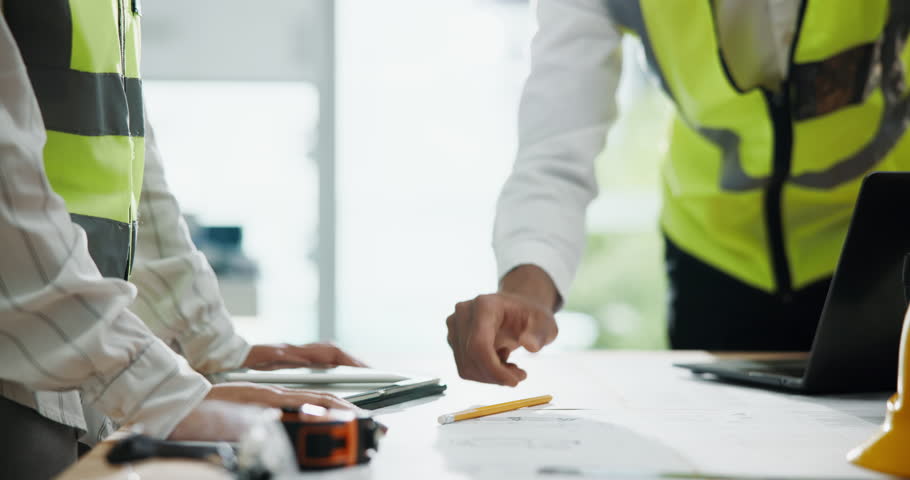 Hands, architect and floor plan with handshake for sketch in office, design and paper at construction company. People, engineer and documents with blueprint, drawing and laptop for property expansion