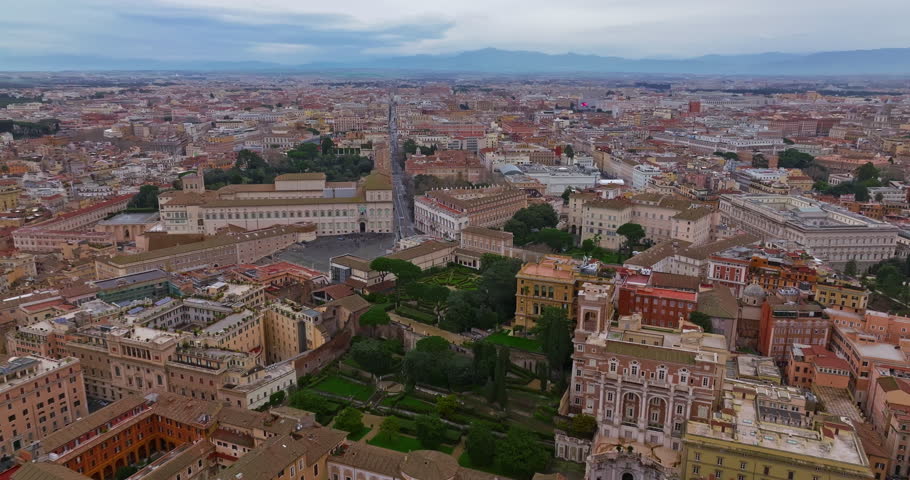 Aerial view rooftops of the city of Rome, Italy. Establishing shot of the capital