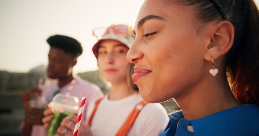 Diversity, friends and walking with drink in city with happy conversation for travel or adventure. Soda, takeaway and people with smile for satisfied, taste and bonding at gen z social gathering