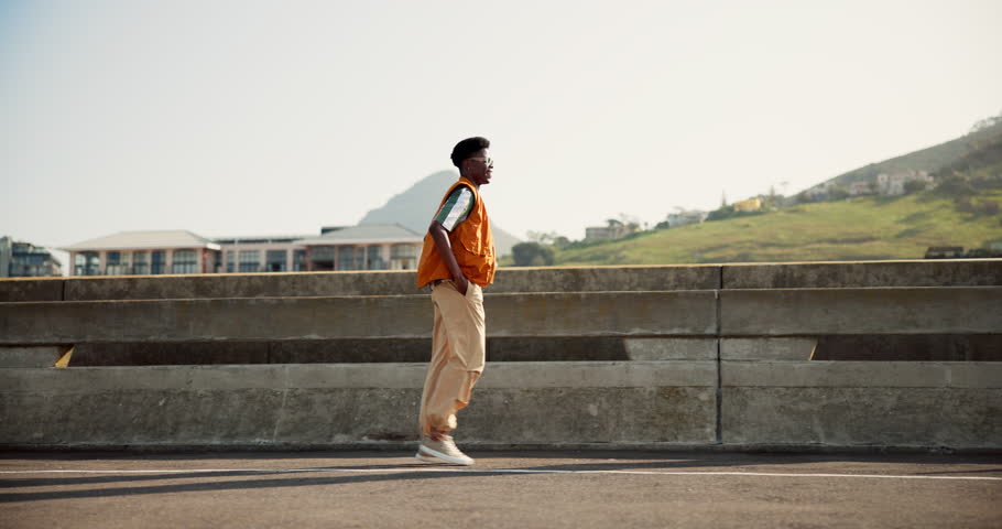 Dance, energy and young with black man in city for freedom, inspiration and creative talent. Performance, streetwear and hip hop dancer with person for celebration, urban and music expression