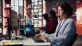 Call center agent uses artificial intelligence to enhance customer interactions and resolve inquiries efficiently. Woman in customer service office using AI communication technologies, camera B - Powered by Shutterstock - Get 15% off with code: PIKWIZARD15