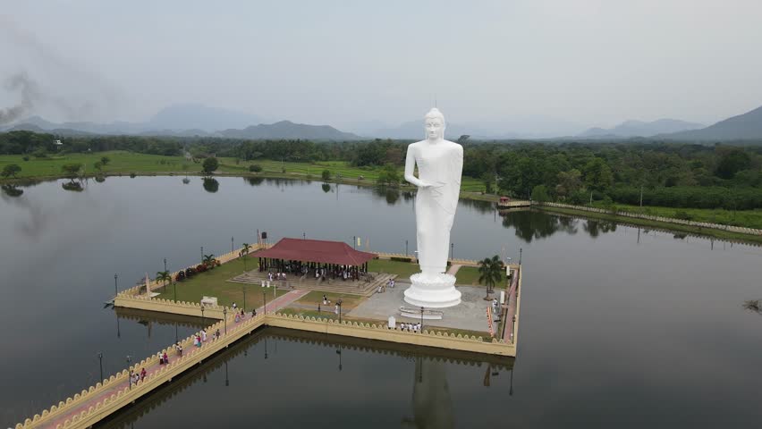 Majestic Buddha Statue Sri Lanka, Lake Surroundings, Aerial Tour, Lake and Nature, 4K Drone
