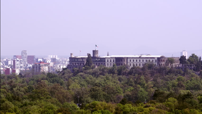 Chapultepec Castle in Chapultepec Forest with Mexican Flags Waving in Spring – Daytime Aerial View in Mexico City