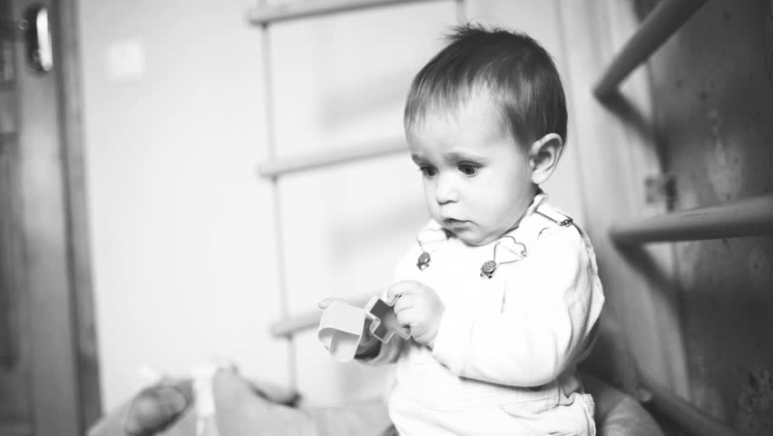 Baby play with toys, video from BW photo sequence