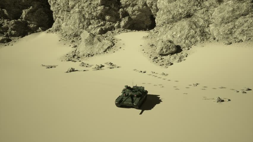 Aerial view of a military tank standing in the vast desert sands, showcasing the stark landscape and machinery.