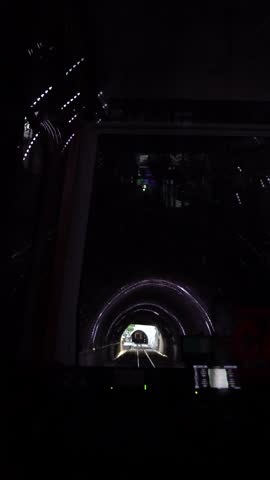 A red cable car is descending in Wellington, New Zealand