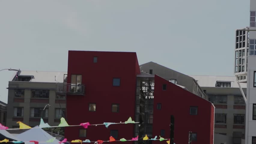 Colorful houses and apartments in Wellington city in New Zealand, summer day.