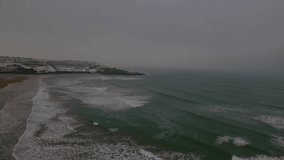 Overlaying animation of stock market data and graphs on ocean waves and coastline. Finance, investment, analytics, technology, data visualization, nature - Powered by Shutterstock - Get 15% off with code: PIKWIZARD15