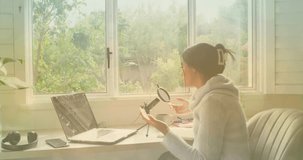 Recording podcast at home, person engaging with animation of social media notifications. broadcasting, communication, influencer, content creator, technology, engagement - Powered by Shutterstock - Get 15% off with code: PIKWIZARD15