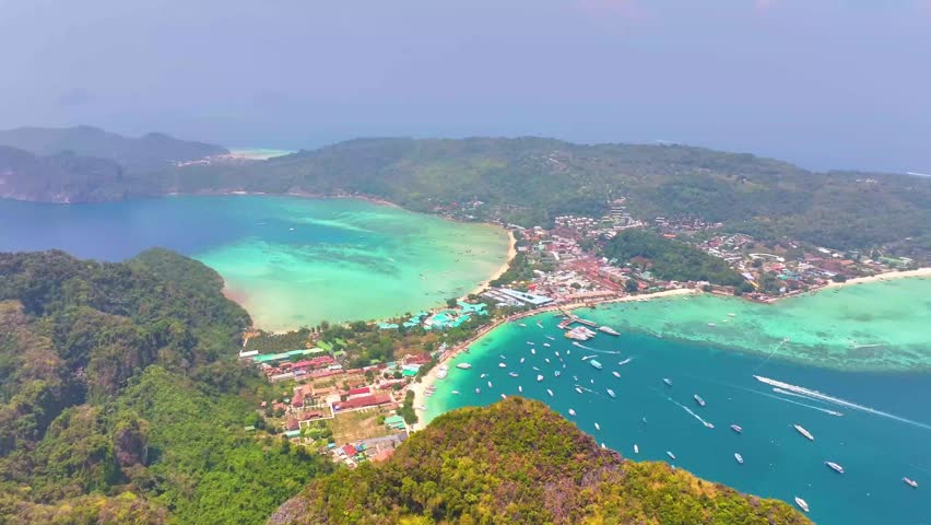 Krabi Province, Thailand. Island Phi Phi. The most island in Thailand. Sea, ocean and mountains of Thailand. Yachts and ships. Incredible views from above. Dron view. View from above.