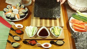 Preparing Nori seaweed for making Sushi rolls