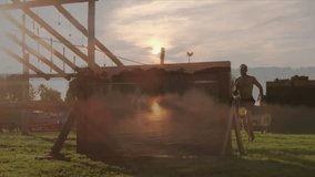 Jumping over obstacle course, person silhouetted against sunset near lake animation. Adventure, challenge, active, determination, fitness, outdoor - Powered by Shutterstock - Get 15% off with code: PIKWIZARD15