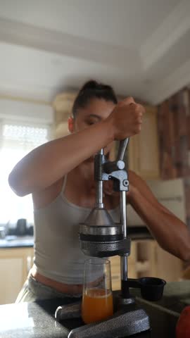 Juice Extraction in a Modern Kitchen using a Citrus Press for Easy and Healthy Beverages