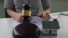 Legal proceedings on property disputes with gavel and model house at attorney's office - Powered by Shutterstock - Get 15% off with code: PIKWIZARD15