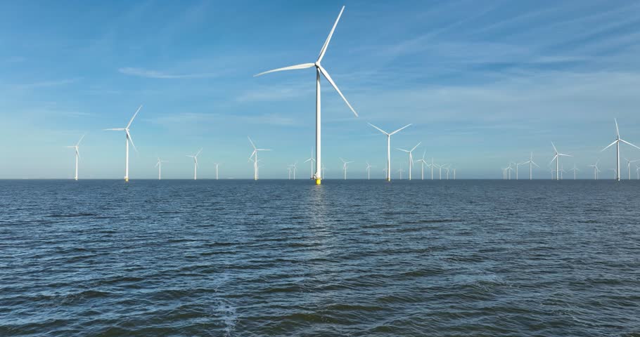 wind turbine on water, off shore wind park. Sustainable energy, renewabale energy.