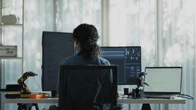 Empowered and confident, this female programmer exemplifies coding prowess amidst team discussions and meetings. - Powered by Shutterstock - Get 15% off with code: PIKWIZARD15