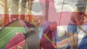 Setting up tents at campsite, people arranging gear with animation flag overlay. Camping, outdoors, adventure, preparation, teamwork, leisure - Powered by Shutterstock - Get 15% off with code: PIKWIZARD15