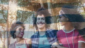 Two women playfully kissing man's cheeks over waving Greek flag animation. Celebration, travel, tourism, Europe, affection, happiness - Powered by Shutterstock - Get 15% off with code: PIKWIZARD15