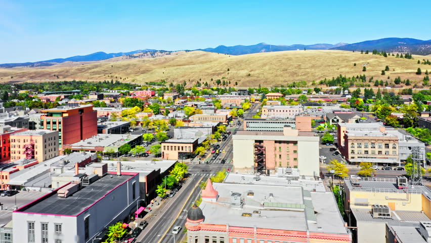 Fly over Missoula, Montana. Missoula is a city in and the county seat of Missoula County, Montana. It is located along the Clark Fork River.