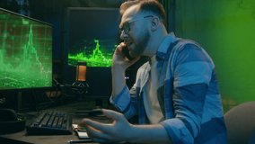 Irritated stressed furious Caucasian trader crypto freelancer male worker discuss stock two mobile phones broker man overworking night at home neon businessman arguing developer guy quarrel deadline - Powered by Shutterstock - Get 15% off with code: PIKWIZARD15