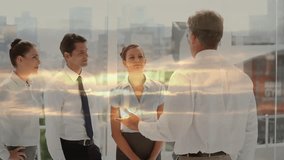 Discussing strategy, business team with cloud animation over cityscape background. Teamwork, collaboration, meeting, planning, cloud computing, innovation - Powered by Shutterstock - Get 15% off with code: PIKWIZARD15