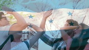 Celebrating outdoors, friends with Honduras flag animation overlay in background. Celebration, friendship, patriotism, unity, diversity, fun - Powered by Shutterstock - Get 15% off with code: PIKWIZARD15