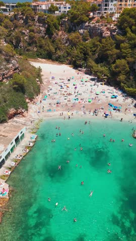 Aerial view of the Bay of Cala Pi in Mallorca, Balearic Islands, Spain. Stunning Mediterranean Sea coast with turquoise water sea bay and white sand beach. Mallorca travel destinations
